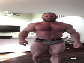 huge bodybuilder posing