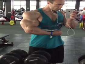 Staring at his arm just like he is