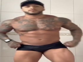 Flexing in posing trunks