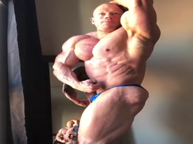 Kille Kujala - huge muscle mass; tiny blue posers
