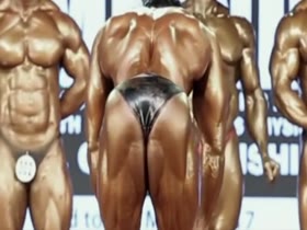 Huge Muscle Gods wearing tiny posers stretched to the limit