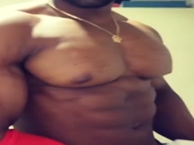 Jayehardbody peels off to pose and pop pecs