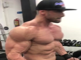 Pumping Hard - working those huge arms