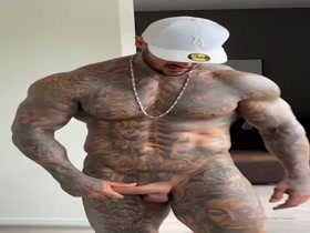 Wow.  Loves his tats.  Loves his muscle