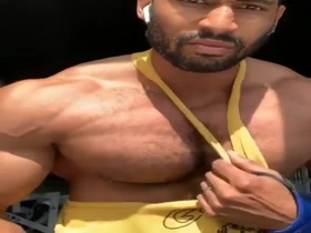 Showing off his hot pecs