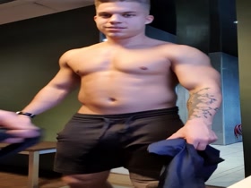 He undresses in locker room