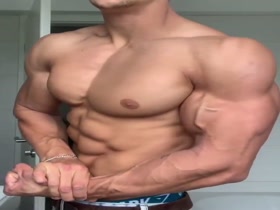 Stunning Young Hunk - and his nipples and biceps