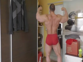 Massive bodybuilder in Red