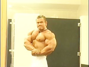 Lee Priest flexing