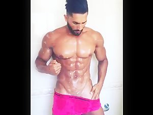 Sexy unknown male model in underwear under the shower. Who is this?
