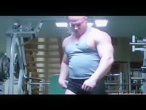Bodybuilder dominates small man