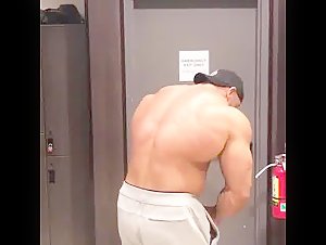 Huge bodybuilder posing