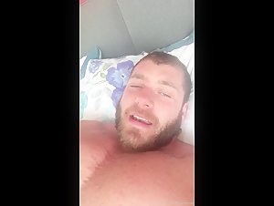 Bodybuilder caressing big chest
