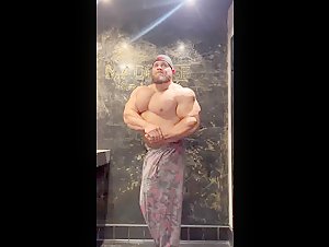 Huge muscle monster flexing
