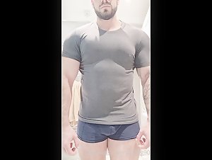 Massive pecs flexing thru shirt