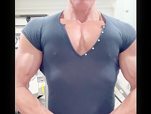 Close up pecs in tight shirt