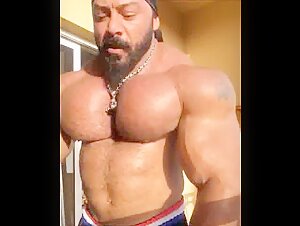 hot daddy showing his muscles