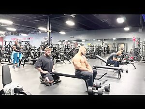 Bodybuilder flexing in the gym Goodvito