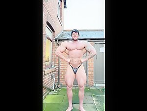 Jamie Christian-Johal flexing