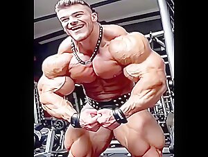 Huge Bodybuilder flexes his massive, manly muscles