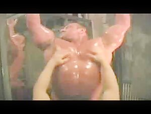 Muscle hunk oiled and milked