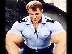 Massive Muscleman in tight Military-Shirt