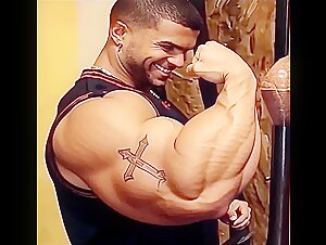 Massive Bodybuilder Castro‘s huge biceps flexing…