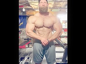 Giant man posing in basement