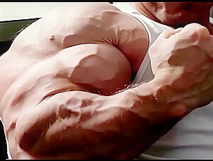 Massive Biceps in Undershirt