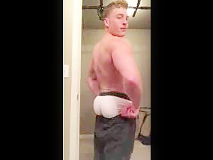 Young bodybuilder in thong