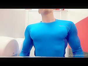 Armzbro blue compression shirt flexing
